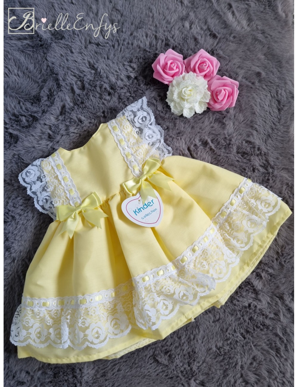 https://www.brielleenfys.co.uk/191-large_default/kinder-collection-frilly-lace-dress-with-matching-satin-bows-3-18-months.jpg
